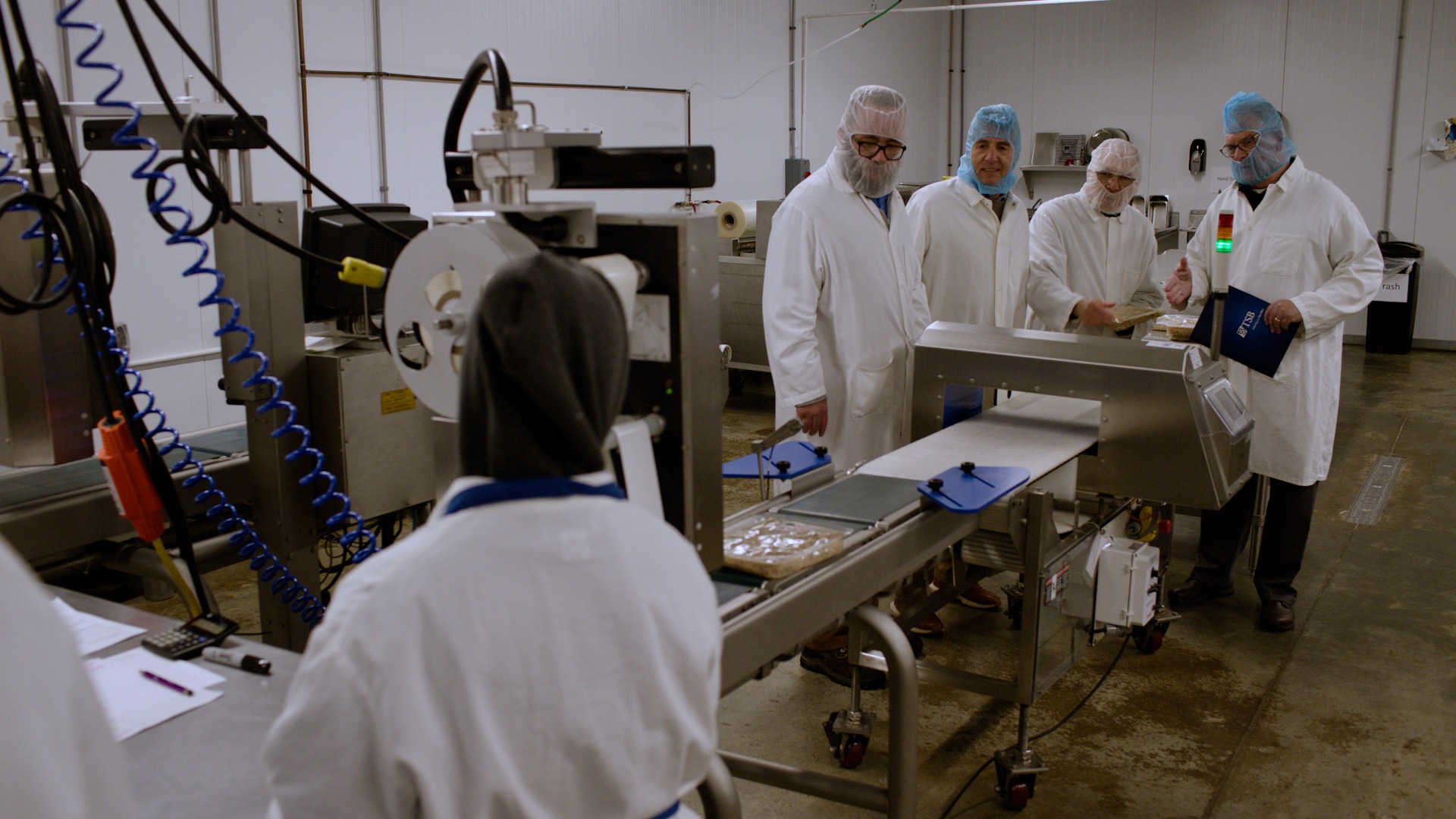 Debb Twigg explaining something to Jon Ward