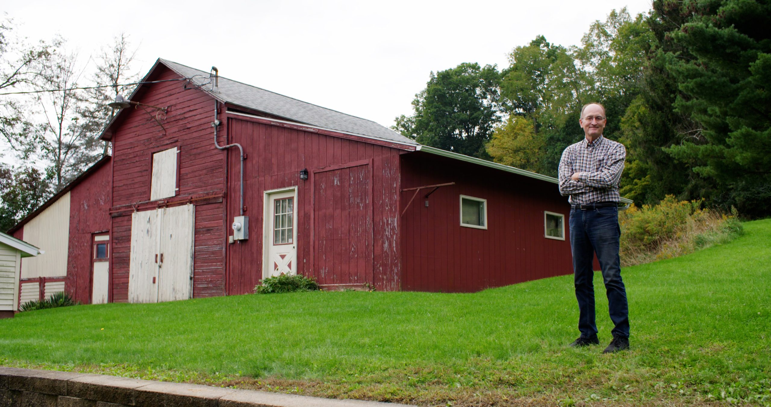 Gary in front of the barn