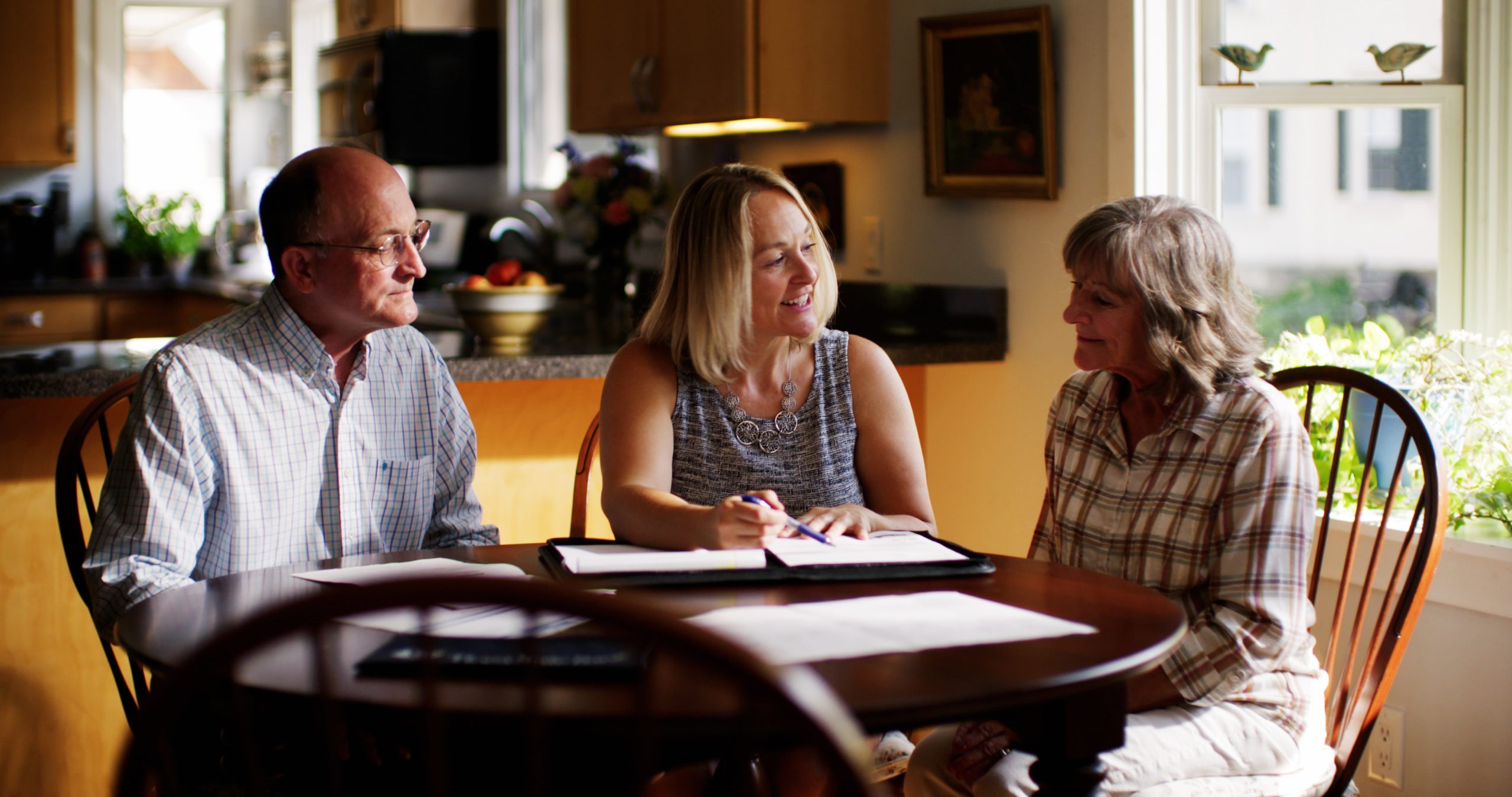 Gary, Kathe and Susan at the kitchen table